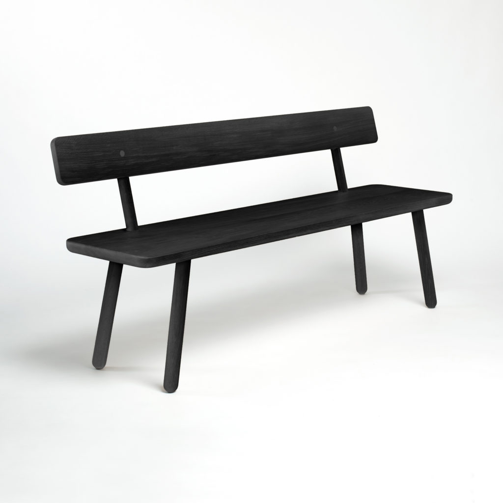 bench_back_one_black_another_country